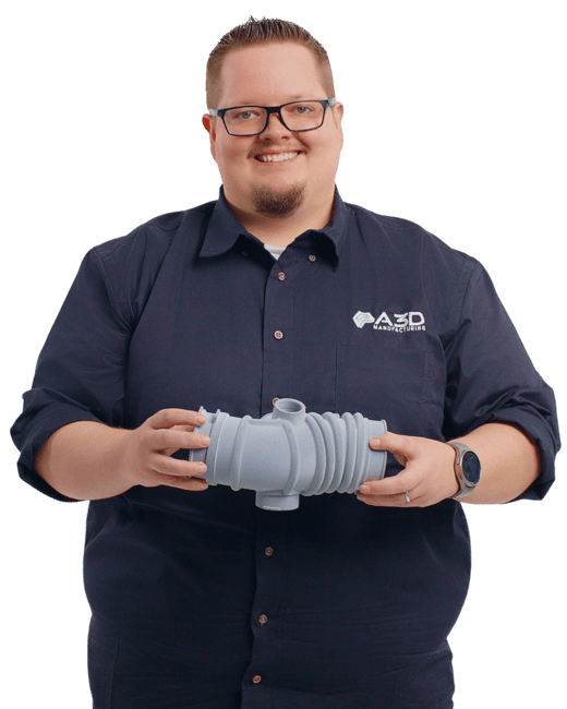 Will Glover holding a part
